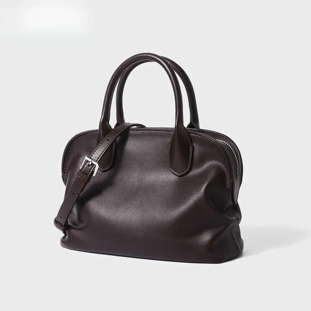 Модная женская сумка-ракушка из натуральной кожи класса люкс, дизайнерская сумка через плечо из воловьей кожи, мини-тоут, новинка, модель Suotong260127
Модная женская сумка-ракушка из натуральной кожи класса люкс, дизайнерская сумка через плечо из воловьей кожи, мини-тоут, новинка, модель Suotong260127