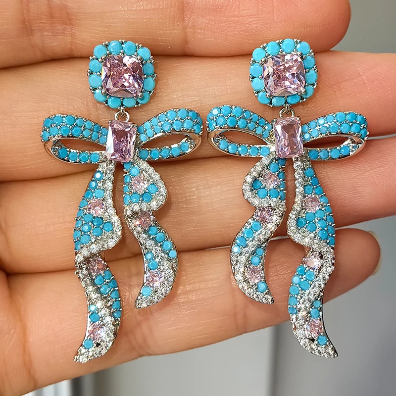 Silver Color Pink Blue Zircon Bowknot Pendant Earrings Cute Women Wedding Dinner Party Jewelry Earrings Sweet Gift Female
Silver Color Pink Blue Zircon Bowknot Pendant Earrings Cute Women Wedding Dinner Party Jewelry Earrings Sweet Gift Female