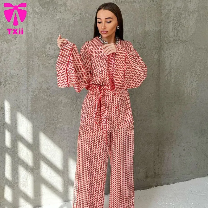 Printed cardigan wool sweater tie pajama two-piece set long sleeved pants women's home wear women's two-piece pants set
Printed cardigan wool sweater tie pajama two-piece set long sleeved pants women's home wear women's two-piece pants set
