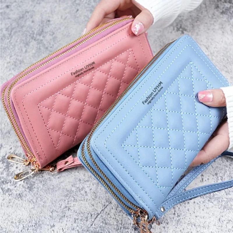 Wallet women's new long handheld Korean casual mobile phone bag with double zipper wallet and large capacity slot
Wallet women's new long handheld Korean casual mobile phone bag with double zipper wallet and large capacity slot