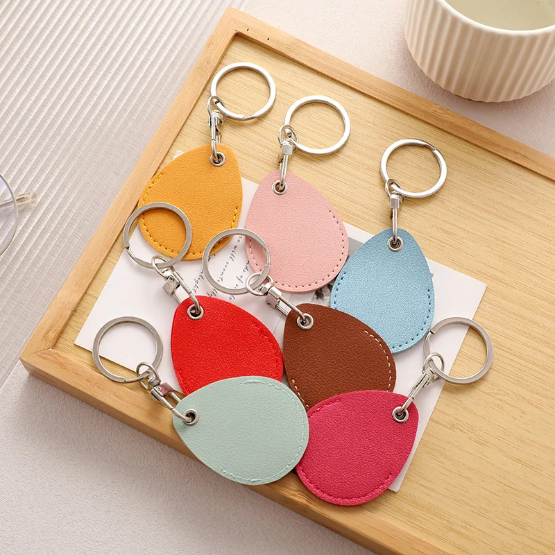 Customized LOGO Keychain Blank PU Leather Droplet Shaped Sensing Access Card Protective Cover Personalized Key Chains Pendant
Customized LOGO Keychain Blank PU Leather Droplet Shaped Sensing Access Card Protective Cover Personalized Key Chains Pendant