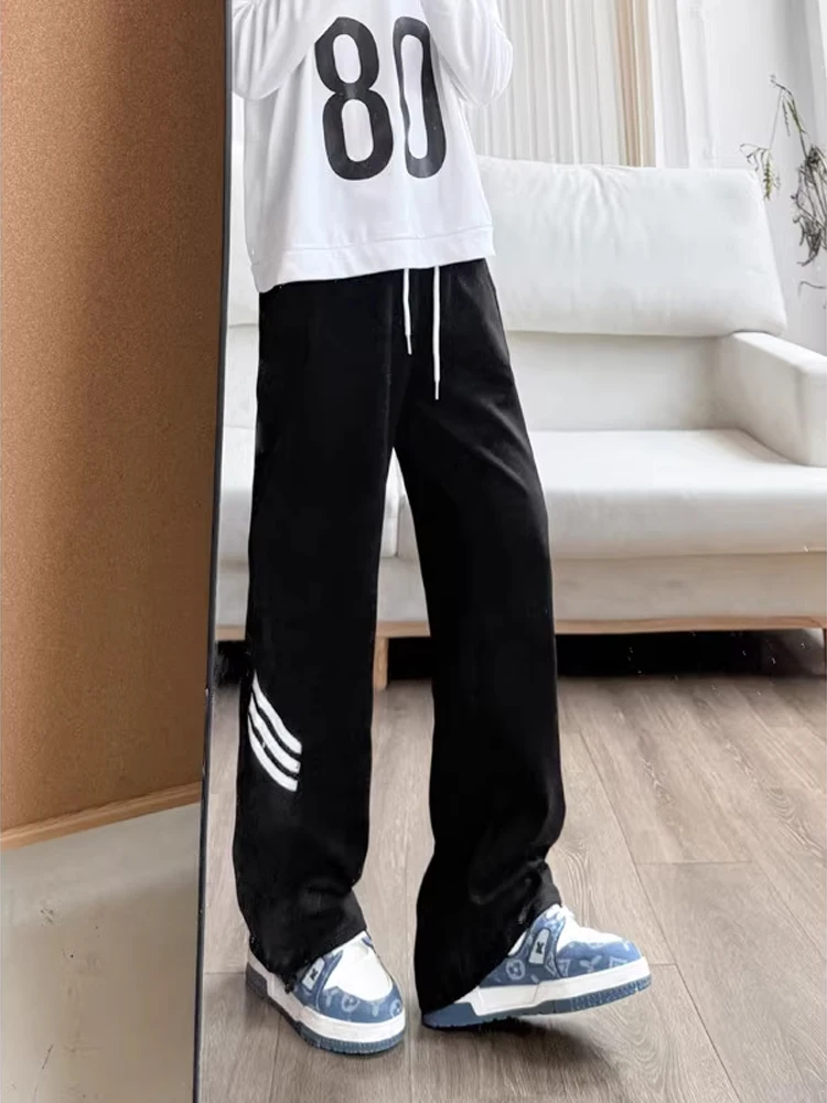 Молодежные прямые спортивные штаны в полоску, мужские осенние драпированные футболки, американские тяжелые свободные повседневные брюки из хлопка и полиэстера
Молодежные прямые спортивные штаны в полоску, мужские осенние драпированные футболки, американские тяжелые свободные повседневные брюки из хлопка и полиэстера