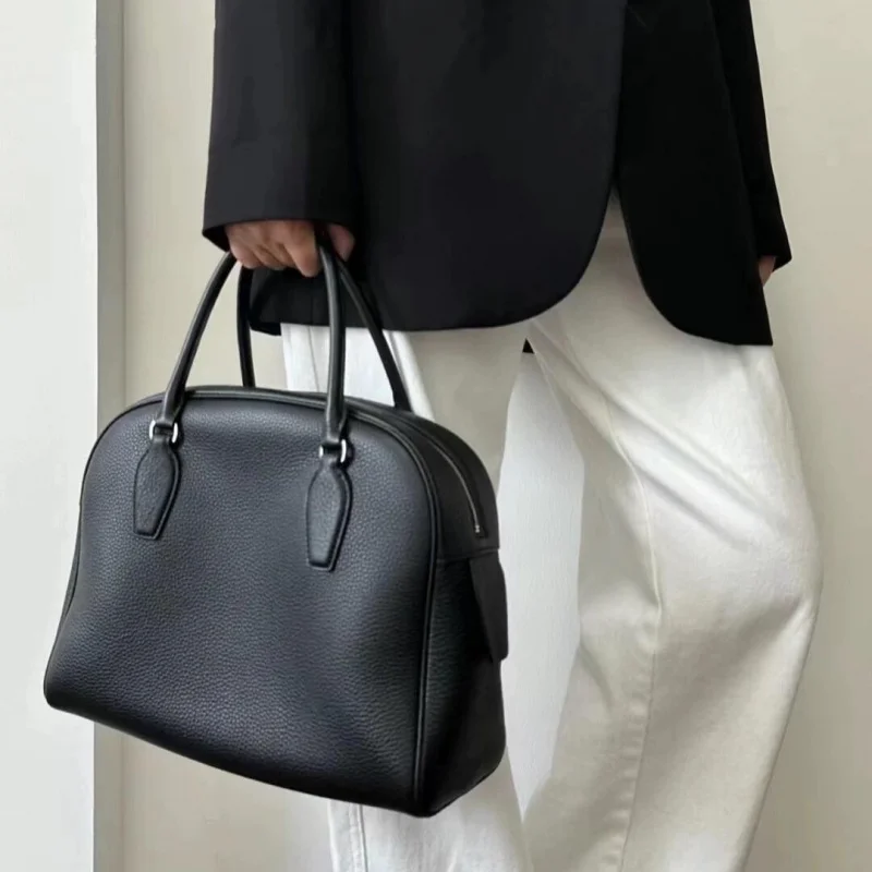 Cowhide Bowling Bag Large Capacity Commuter Portable Shoulder Crossbody Bag suitcase genuine leather handbags for women tote bag
Cowhide Bowling Bag Large Capacity Commuter Portable Shoulder Crossbody Bag suitcase genuine leather handbags for women tote bag