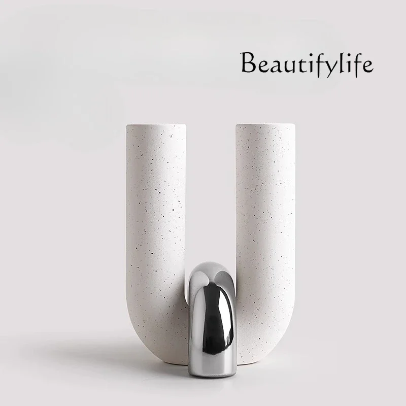 Light luxury creative simple U-shaped cross vase ornament living room entrance TV cabinet frosted ceramic flower ware
Light luxury creative simple U-shaped cross vase ornament living room entrance TV cabinet frosted ceramic flower ware
