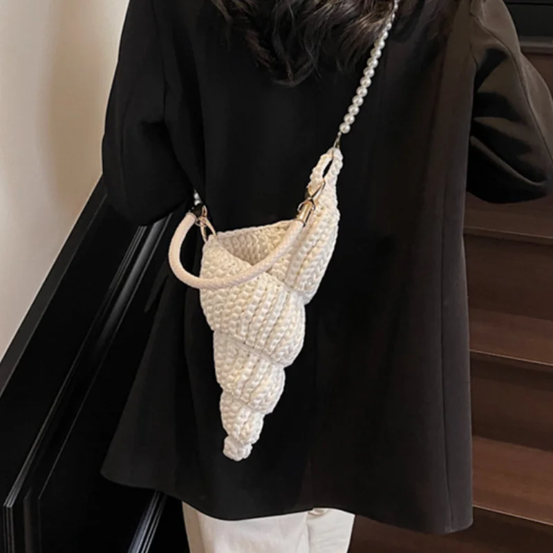 Fashion Hand-woven Conch Shell Bag Luxury Pearl Chain Crossbody Bag High-quality Beach Holiday Bags Women Cute Seashell Handbag
Fashion Hand-woven Conch Shell Bag Luxury Pearl Chain Crossbody Bag High-quality Beach Holiday Bags Women Cute Seashell Handbag