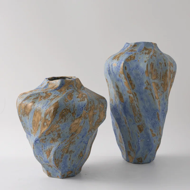 Jingdezhen ceramic ornaments, light luxury and high-end Wabi Sabi style artistic vases, retro pottery jars, dining table
Jingdezhen ceramic ornaments, light luxury and high-end Wabi Sabi style artistic vases, retro pottery jars, dining table