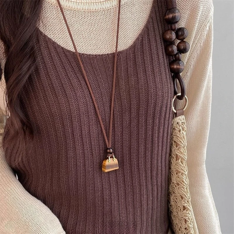 Brown Bag-Shaped Long Necklace Women's Fashionable Sweater Chain Luxurious Vintage Neck Accessory
Brown Bag-Shaped Long Necklace Women's Fashionable Sweater Chain Luxurious Vintage Neck Accessory