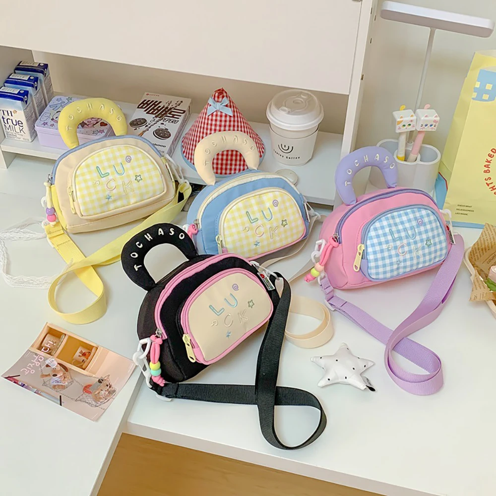Kids Shoulder Bag Sweet Letter Girls Portable Bag Cute Grid Outdoor Color Blocking Children Handbag
Kids Shoulder Bag Sweet Letter Girls Portable Bag Cute Grid Outdoor Color Blocking Children Handbag