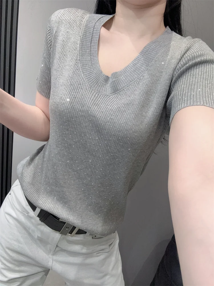 Heavy industry hot stamping round neck short sleeved women summer ice silk knitted design slim fit and elastic versatile top
Heavy industry hot stamping round neck short sleeved women summer ice silk knitted design slim fit and elastic versatile top
