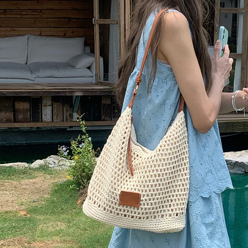 Woven hollowed-out women's bags, seaside vacation tote bags, beach bags, single-shoulder underarm bags, simple crossbody bags
Woven hollowed-out women's bags, seaside vacation tote bags, beach bags, single-shoulder underarm bags, simple crossbody bags
