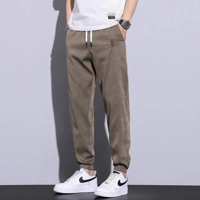 Mens Drawstring Waist Pocket Jogger Pants Embroidery Patch Detail Loose Casual Trousers
Mens Drawstring Waist Pocket Jogger Pants Embroidery Patch Detail Loose Casual Trousers
