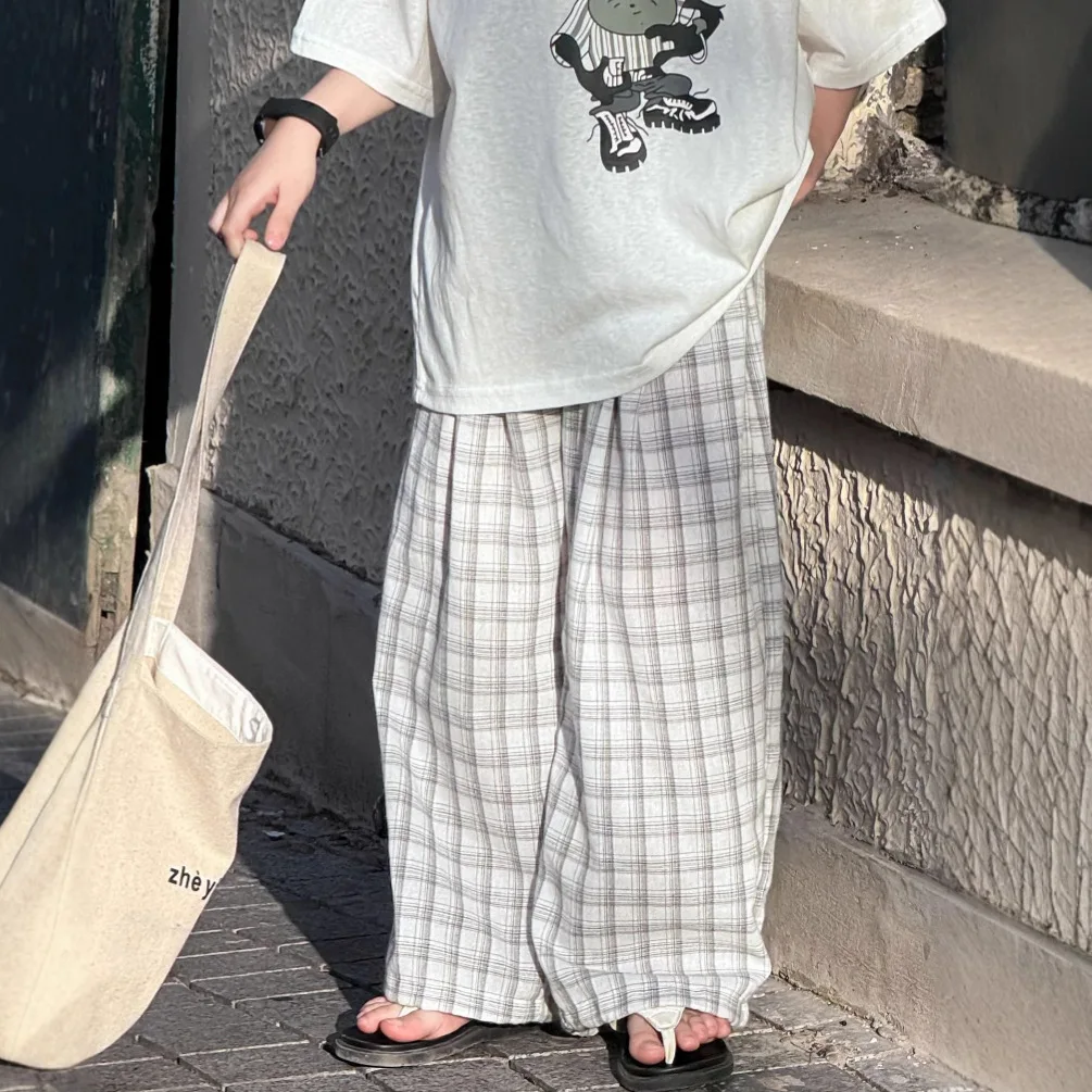 25 Summer New Korean Children's Clothing Black and White Checkered Loose Water Washed Cotton and Hemp Mosquito Resistant Pants
25 Summer New Korean Children's Clothing Black and White Checkered Loose Water Washed Cotton and Hemp Mosquito Resistant Pants