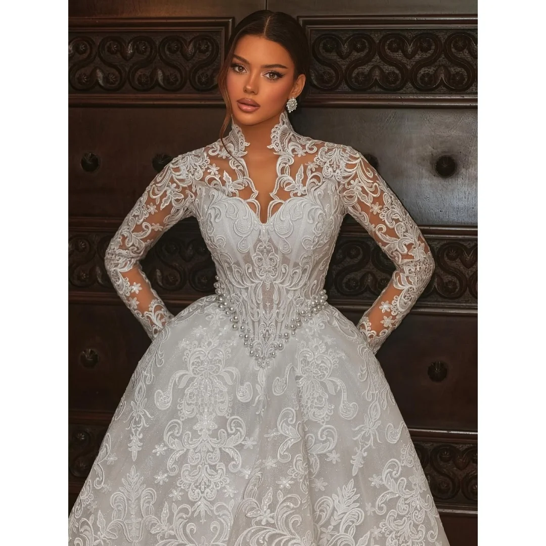 Custom High Neck Illusion Long Sleeve Lace Ball Gown Wedding Dress with Pearl Waist Court Train Bridal Gown Vestido De Noiva
Custom High Neck Illusion Long Sleeve Lace Ball Gown Wedding Dress with Pearl Waist Court Train Bridal Gown Vestido De Noiva