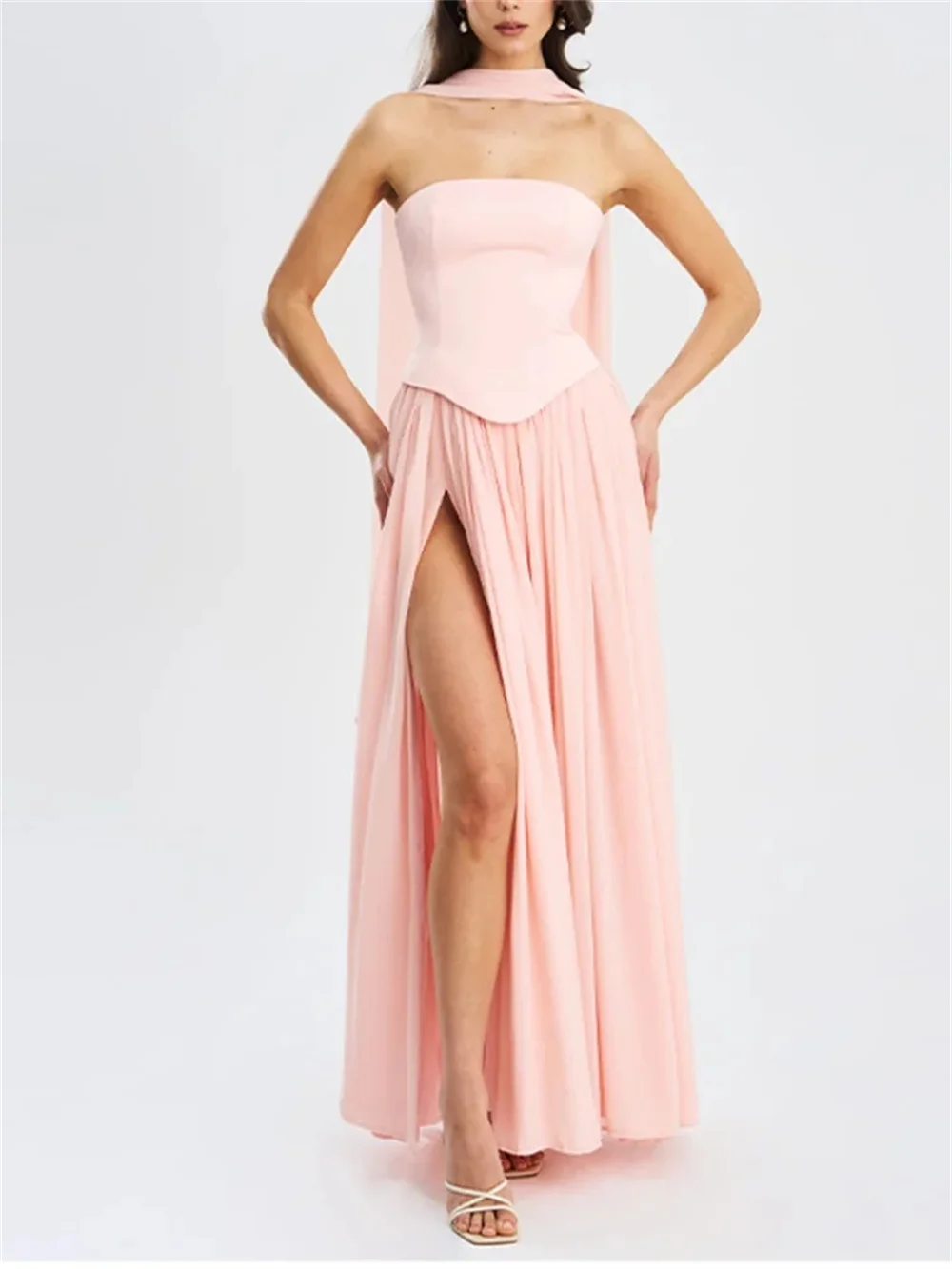 Soft pink strapless waist-cinching floor-length gown with high front slit to show long legs, tailored fit shapes curves. All siz
Soft pink strapless waist-cinching floor-length gown with high front slit to show long legs, tailored fit shapes curves. All siz