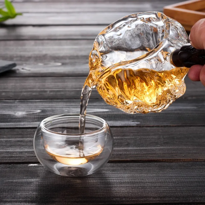 Glass Tea Divider Walnut Tea Sea Tea set Japanese Style Kung Fu Tea Pot Thickened Creative Side Handle Tea Coffee Milk Pot ZG176
Glass Tea Divider Walnut Tea Sea Tea set Japanese Style Kung Fu Tea Pot Thickened Creative Side Handle Tea Coffee Milk Pot ZG176