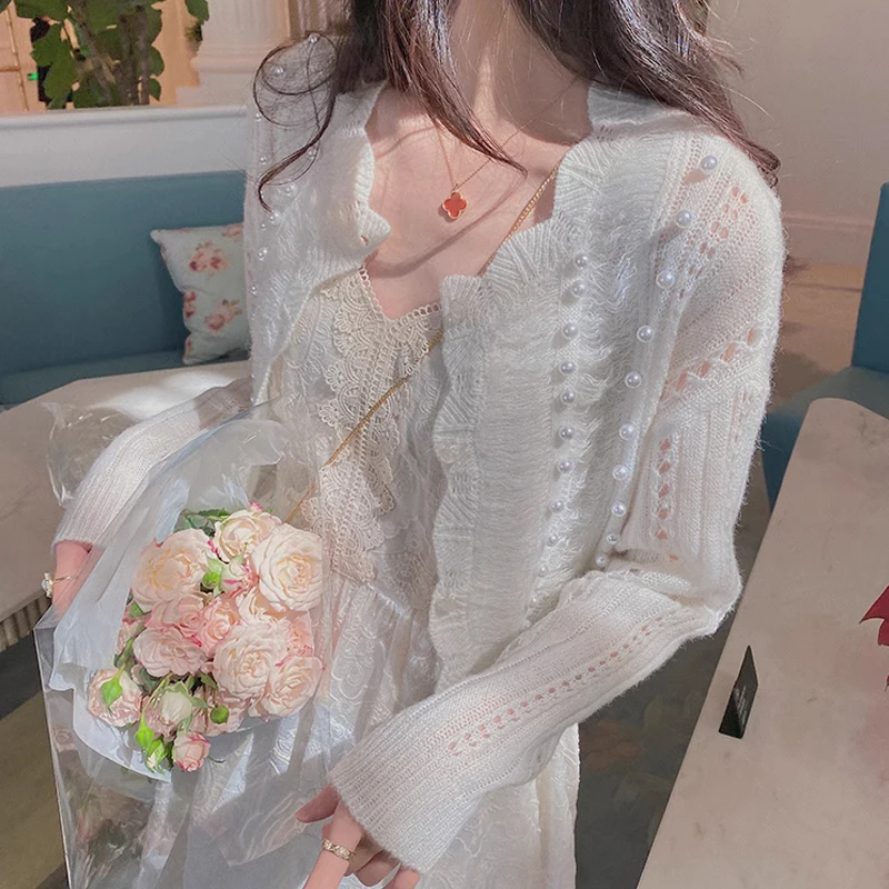 Thin Knitted Cardigan Women Sweater Autumn 2023 Elegant Hollow Beading Long Sleeve Jacket Tops Air Conditioning Knitwears 28112
Thin Knitted Cardigan Women Sweater Autumn 2023 Elegant Hollow Beading Long Sleeve Jacket Tops Air Conditioning Knitwears 28112