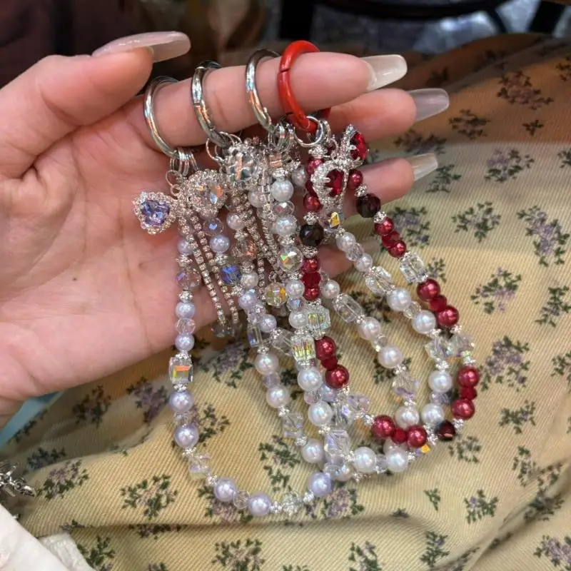 Цельный модный блестящий бриллиантовый бант, цепочка для телефона, кулон, брелок для телефона Y2K, подвесной ремешок на запястье, ремешок для мобильного телефона из бисера
Цельный модный блестящий бриллиантовый бант, цепочка для телефона, кулон, брелок для телефона Y2K, подвесной ремешок на запястье, ремешок для мобильного телефона из бисера