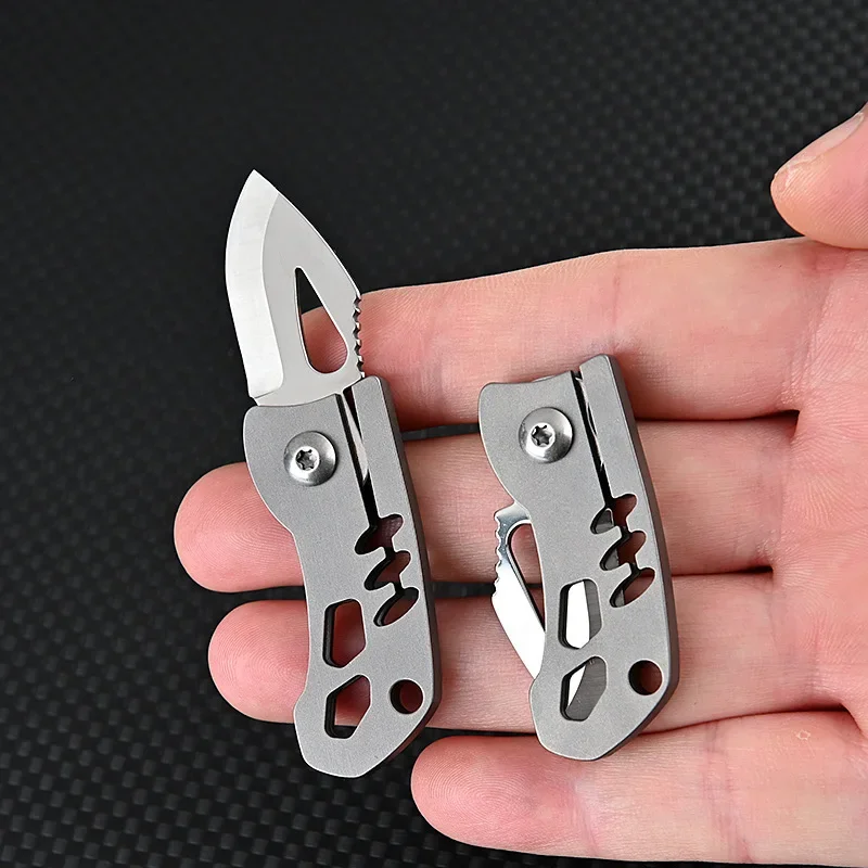 Titanium Alloy Handle Sharp Mini Folding Blade Knife D2 Steel Portable Unpacking Express Keychain Tool EDC Knife Survival
Titanium Alloy Handle Sharp Mini Folding Blade Knife D2 Steel Portable Unpacking Express Keychain Tool EDC Knife Survival