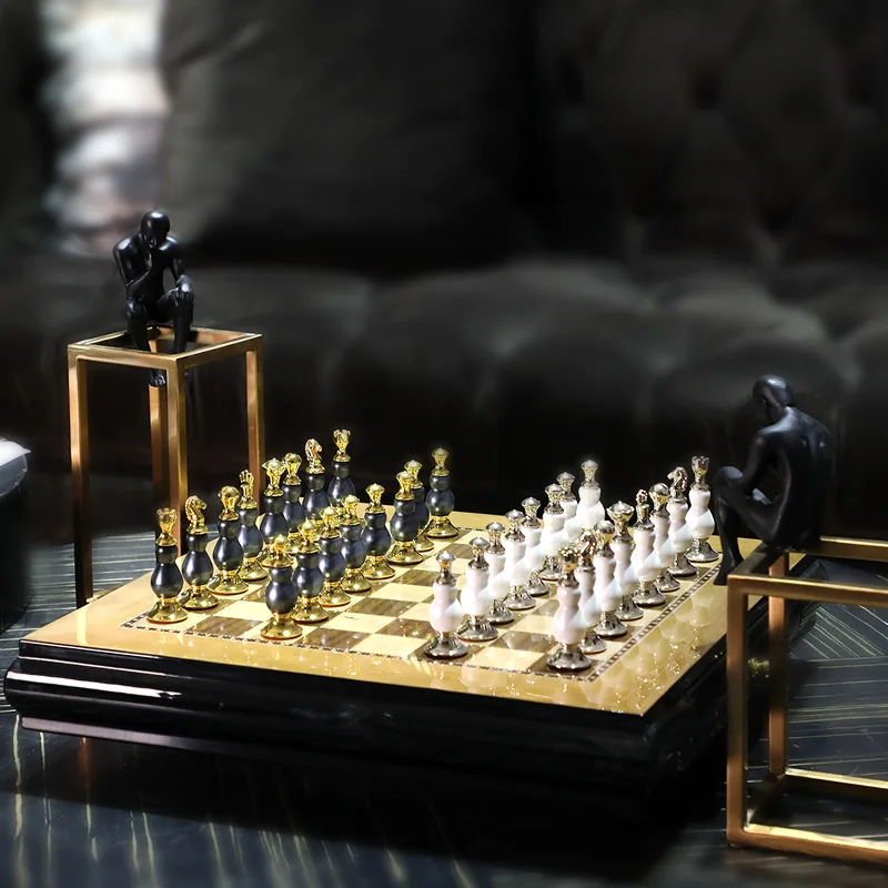 Black and white wooden piano paint process plus zinc alloy chessboard ornament
Black and white wooden piano paint process plus zinc alloy chessboard ornament