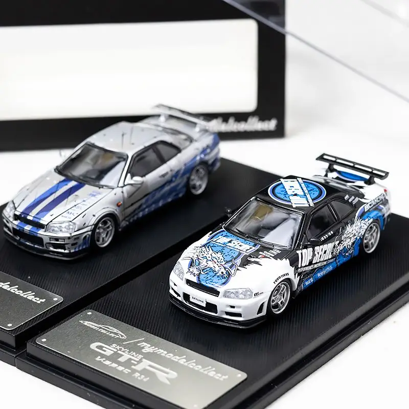 Литой под давлением MC масштаб 1:64 GTR R34 V-SPEC-II MK5 Skyline модель автомобиля из сплава Коллекционная игрушка в подарок сувенирный дисплей орнамент
Литой под давлением MC масштаб 1:64 GTR R34 V-SPEC-II MK5 Skyline модель автомобиля из сплава Коллекционная игрушка в подарок сувенирный дисплей орнамент