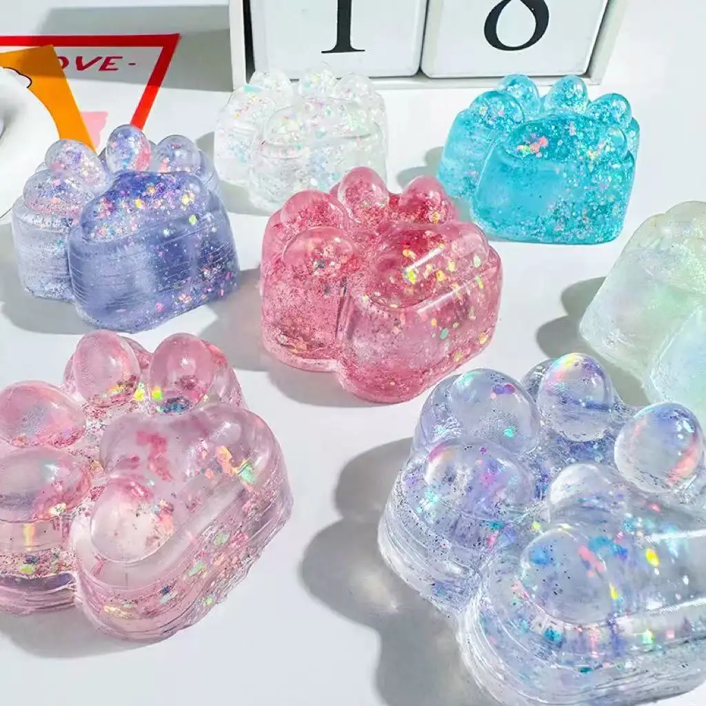 Large-sized crystal transparent cat paw squeeze toy for relaxation and stress relief. It is a girl-shaped soft rubber toy with a gentle and rebounding feeling, giving a soft and cuddly sensation.
Large-sized crystal transparent cat paw squeeze toy for relaxation and stress relief. It is a girl-shaped soft rubber toy with a gentle and rebounding feeling, giving a soft and cuddly sensation.