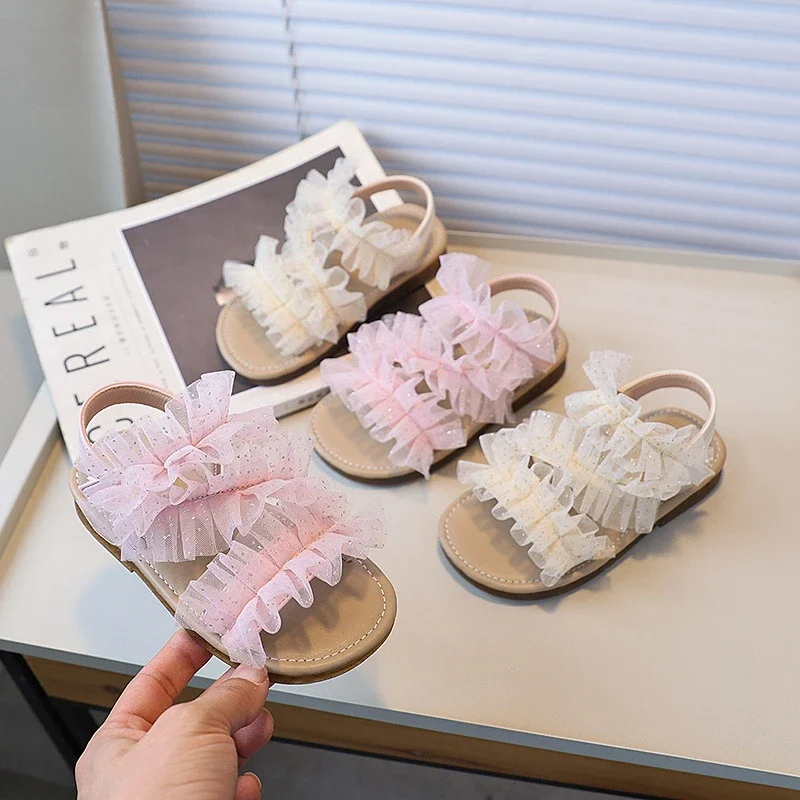 Girl Summer Sandals 2025 New Sweet Lace Pleated Princess Versatile Kids Wedding Party Shoes Fashion Chic Children Flat Sandals
Girl Summer Sandals 2025 New Sweet Lace Pleated Princess Versatile Kids Wedding Party Shoes Fashion Chic Children Flat Sandals