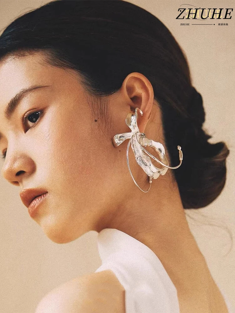 Bohemian Copper Jewelry Accessories: Avant-Garde Drop Earrings for Women & Edgy Fashion Accents for Men – Organic Curved Shape,
Bohemian Copper Jewelry Accessories: Avant-Garde Drop Earrings for Women & Edgy Fashion Accents for Men – Organic Curved Shape,