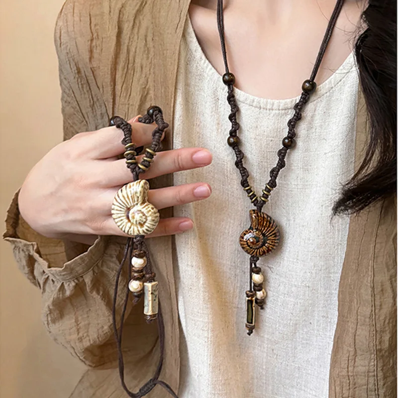 New Chinese style conch unique personality necklace, women's retro ethnic style fashion matching necklace accessories
New Chinese style conch unique personality necklace, women's retro ethnic style fashion matching necklace accessories