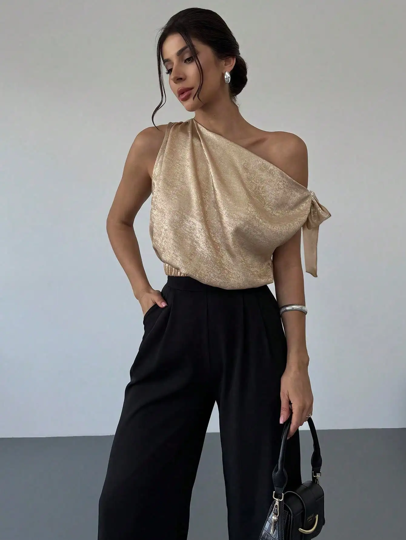 Women's Asymmetric Off-Shoulder Metallic Blouse with Side Tie, Loose Fit for Parties & Daily Wear
Women's Asymmetric Off-Shoulder Metallic Blouse with Side Tie, Loose Fit for Parties & Daily Wear