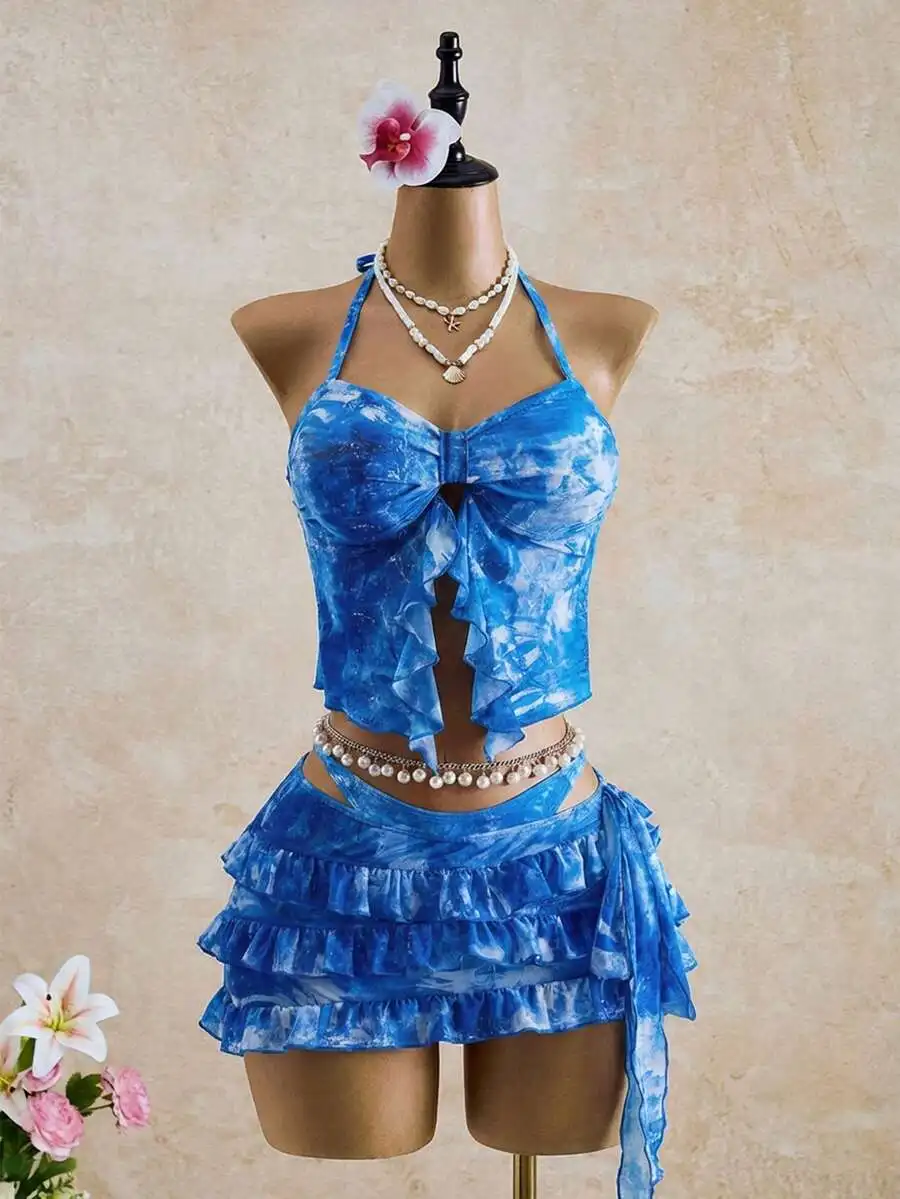 Blue Tie-Dye Ruffled Halter Top And Skirted Bikini Set For Women
Blue Tie-Dye Ruffled Halter Top And Skirted Bikini Set For Women
