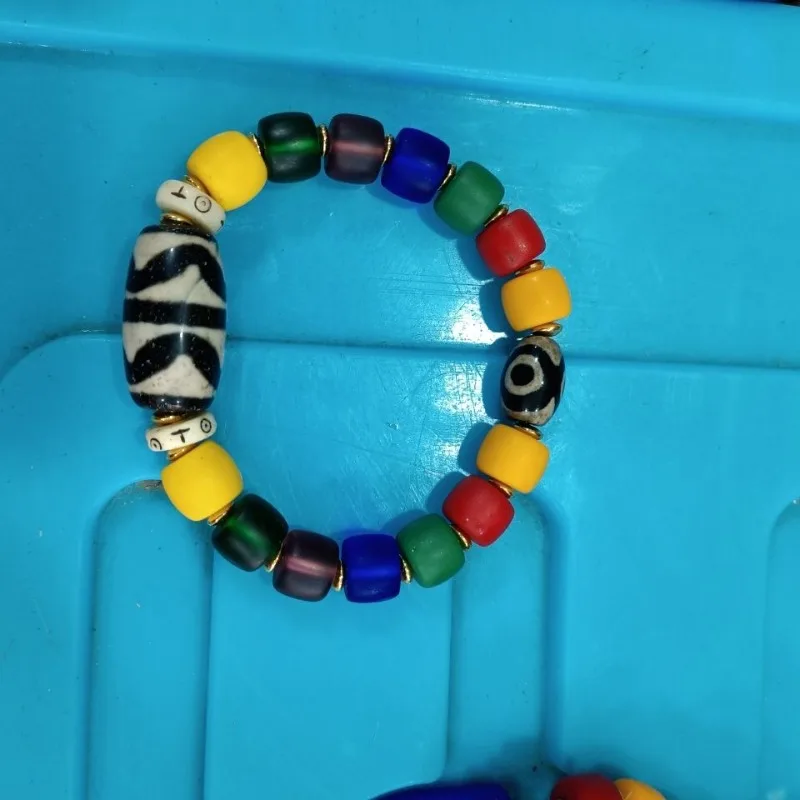 Новый браслет из бусин Дзи с девятью глазами, универсальный агатовый браслет для мужчин и женщин.
Новый браслет из бусин Дзи с девятью глазами, универсальный агатовый браслет для мужчин и женщин.