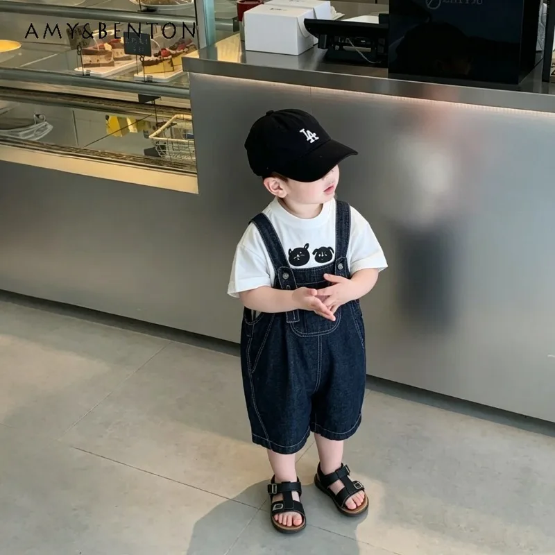 2026 New Summer Boys 2Pcs Outfit Cartoon Puppy Print Short Sleeve T-Shirt Denim Overalls Shorts Kids Matching Two Piece Set
2026 New Summer Boys 2Pcs Outfit Cartoon Puppy Print Short Sleeve T-Shirt Denim Overalls Shorts Kids Matching Two Piece Set