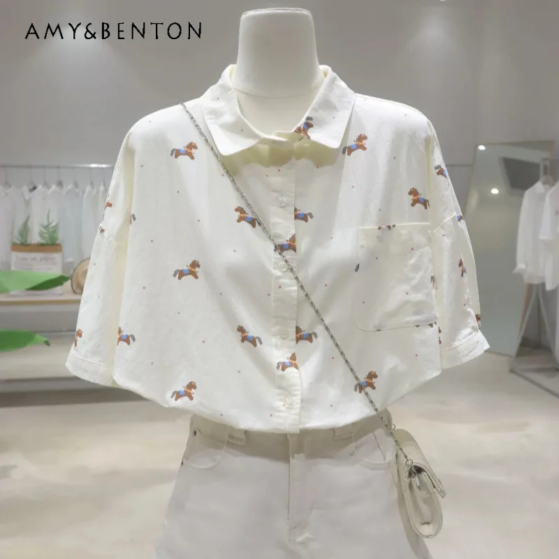 2026 Summer New Women Cotton Short Sleeves Shirt Full Cartoon Print Fresh Breathable Loose Slim Irregular Hem Casual Top Blouse
2026 Summer New Women Cotton Short Sleeves Shirt Full Cartoon Print Fresh Breathable Loose Slim Irregular Hem Casual Top Blouse