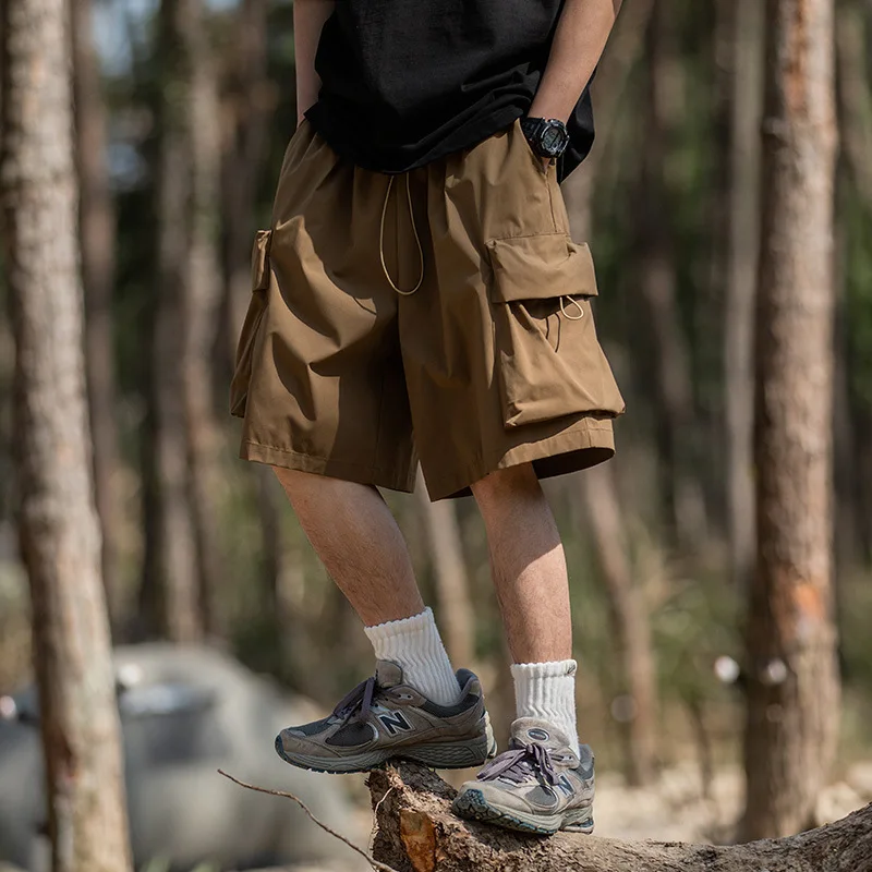 Men's J-Style Utility Shorts Summer 2025 Loose Fit Drawstring Waist Oversized Pocket Streetwear Mid-Length
Men's J-Style Utility Shorts Summer 2025 Loose Fit Drawstring Waist Oversized Pocket Streetwear Mid-Length