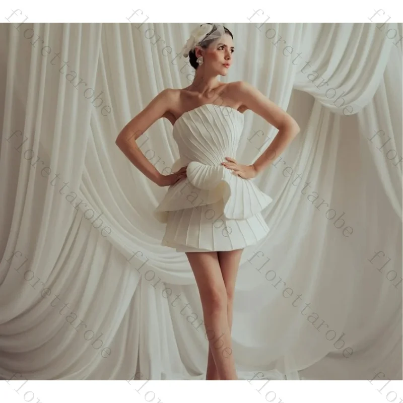 Customized White Strapless Pleated Tiered Mini Bridal Dress Satin Backless Short Wedding Gown for Romantic Elopement Party
Customized White Strapless Pleated Tiered Mini Bridal Dress Satin Backless Short Wedding Gown for Romantic Elopement Party