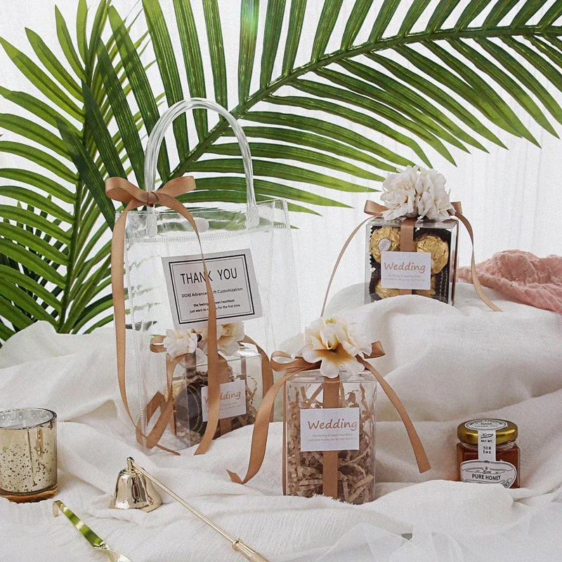 Transparent Candy Box Artificial Flower Ribbon Gift Box Romantic Wedding Favor Holder Chocolate Packaging Bag Party Supplies
Transparent Candy Box Artificial Flower Ribbon Gift Box Romantic Wedding Favor Holder Chocolate Packaging Bag Party Supplies