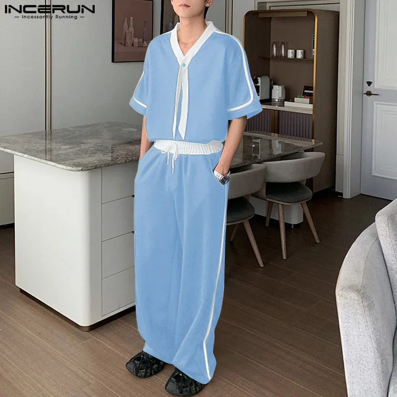 INCERUN Мужские комплекты в стиле пэчворк, летние свободные футболки с короткими рукавами и брюки, комплекты из двух предметов, уличная одежда, модные мужские повседневные костюмы 2025 года
INCERUN Мужские комплекты в стиле пэчворк, летние свободные футболки с короткими рукавами и брюки, комплекты из двух предметов, уличная одежда, модные мужские повседневные костюмы 2025 года