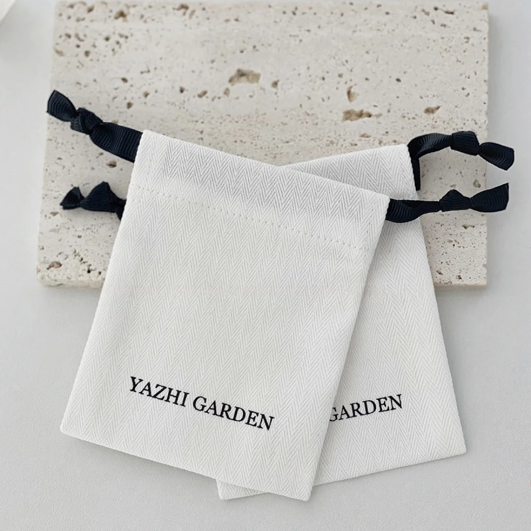 Cotton Jewelry Pouches Thick Canvas Pouch Bags with Ribbon Drawstring Bags Personalized Printed Jewelry Packaging
Cotton Jewelry Pouches Thick Canvas Pouch Bags with Ribbon Drawstring Bags Personalized Printed Jewelry Packaging