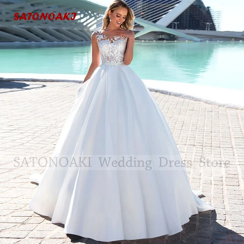 Elegant Sexy O-Neck Lace Satin Wedding Dresses for Women A-Line Sweep Train Backless Bridal Gowns Vestido De Novia Custom Made
Elegant Sexy O-Neck Lace Satin Wedding Dresses for Women A-Line Sweep Train Backless Bridal Gowns Vestido De Novia Custom Made