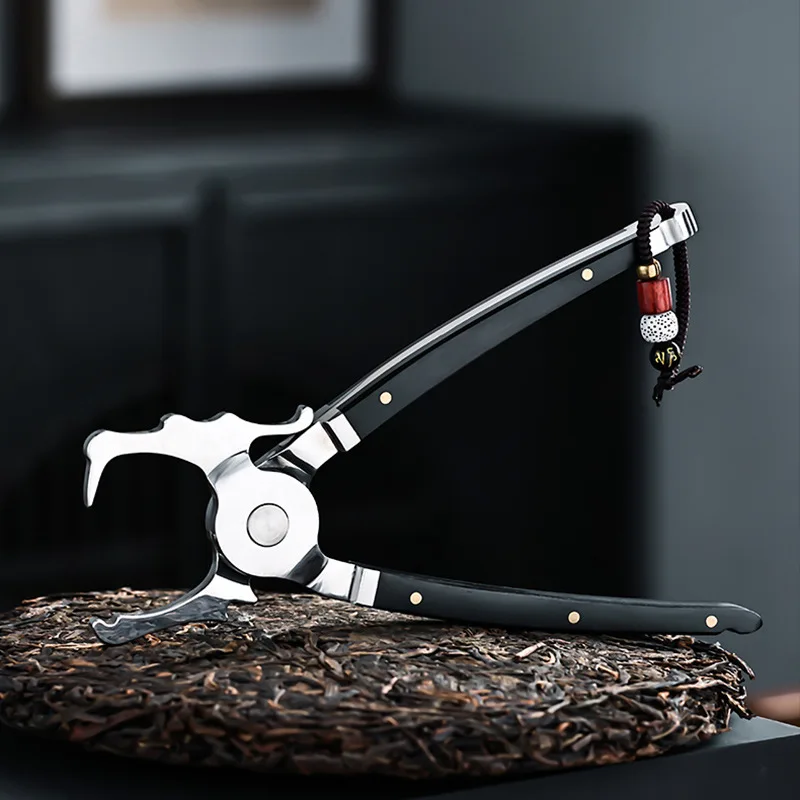 Stainless Steel Puer Tea Cutter with Decorative Bead Tassel Heavy Duty Pliers for Breaking Compressed Tea Brick
Stainless Steel Puer Tea Cutter with Decorative Bead Tassel Heavy Duty Pliers for Breaking Compressed Tea Brick