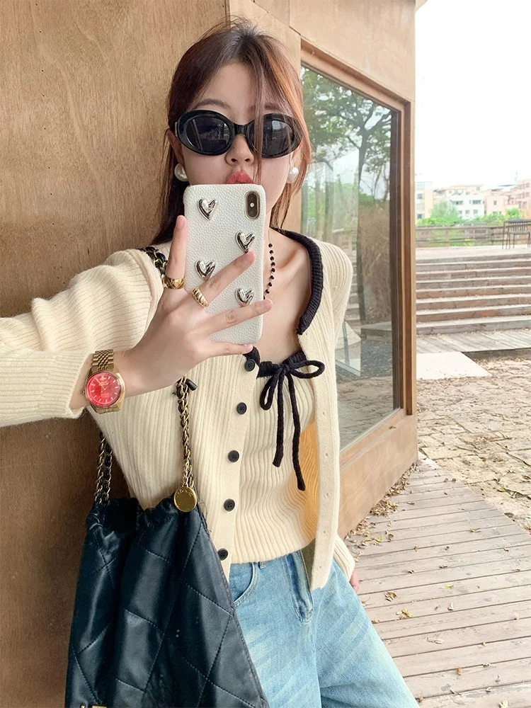 Мягкий нежный женский вязаный жилет и свитер, комплект из двух предметов, длинный свеч, круглые пуговицы, модная осенняя одежда для подростков
Мягкий нежный женский вязаный жилет и свитер, комплект из двух предметов, длинный свеч, круглые пуговицы, модная осенняя одежда для подростков