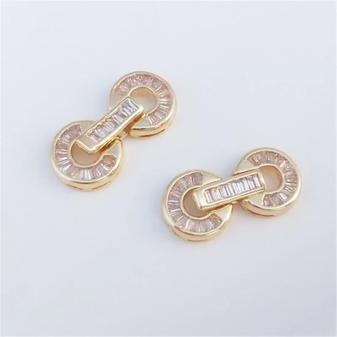 Micro Inlaid T-shaped Zircon 14K Gold Double Ring Pearl Buckle Bracelet Sweater Necklace 8-shaped Buckle DIY Jewelry Accessories
Micro Inlaid T-shaped Zircon 14K Gold Double Ring Pearl Buckle Bracelet Sweater Necklace 8-shaped Buckle DIY Jewelry Accessories