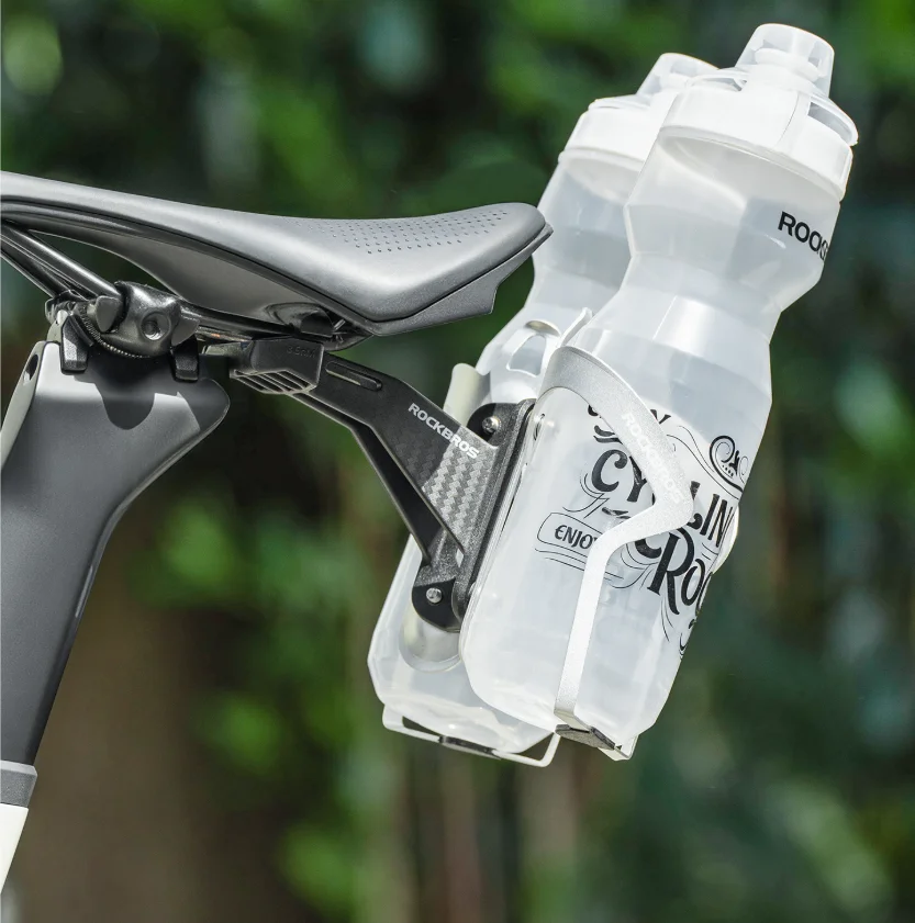 ROCKBROS Kettle Holder Adapter Bicycle Saddle Bottle Rack Extension Stand Imitation Carbon Fiber Nylon Bracket Bike Accessories
ROCKBROS Kettle Holder Adapter Bicycle Saddle Bottle Rack Extension Stand Imitation Carbon Fiber Nylon Bracket Bike Accessories