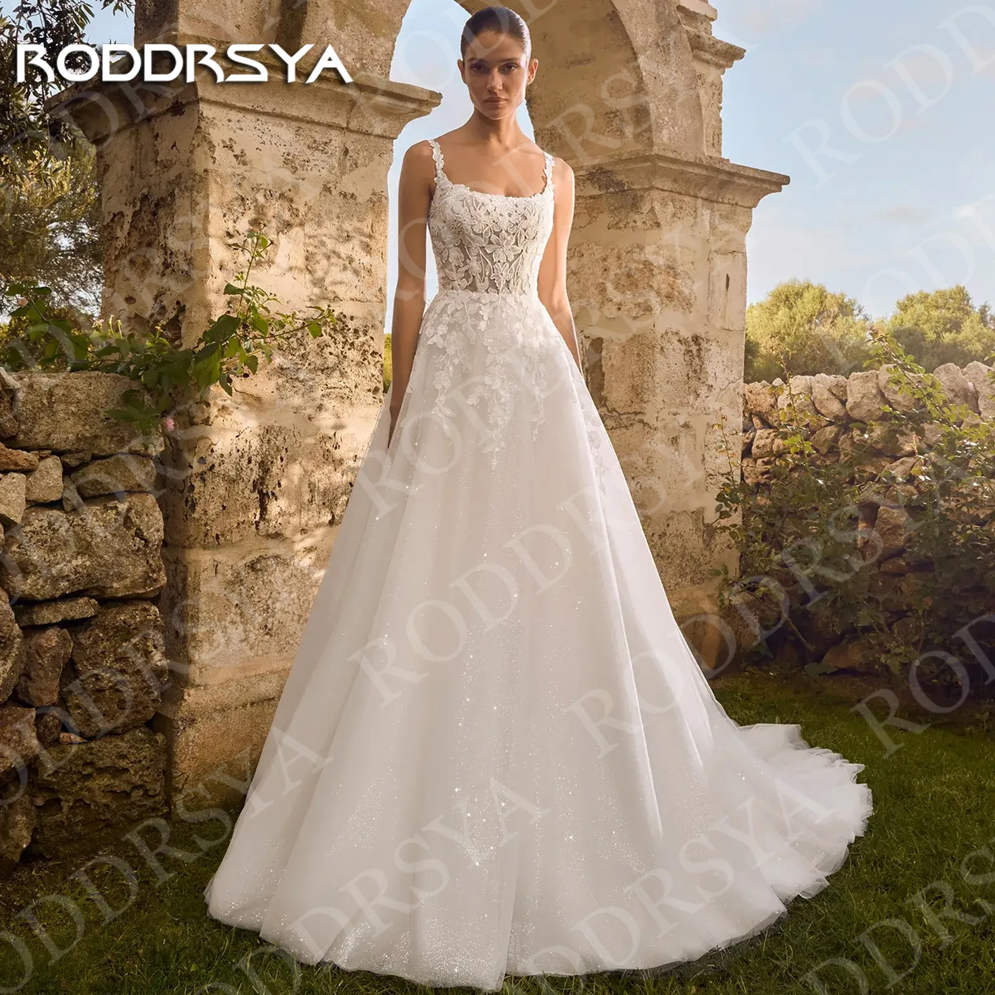 RODDRSYA Square Neck Spaghetti Strap Wedding Dress Bohemian Romantic Lace Appliques Sparkly Tulle Bridal Dresses Customized 2026
RODDRSYA Square Neck Spaghetti Strap Wedding Dress Bohemian Romantic Lace Appliques Sparkly Tulle Bridal Dresses Customized 2026