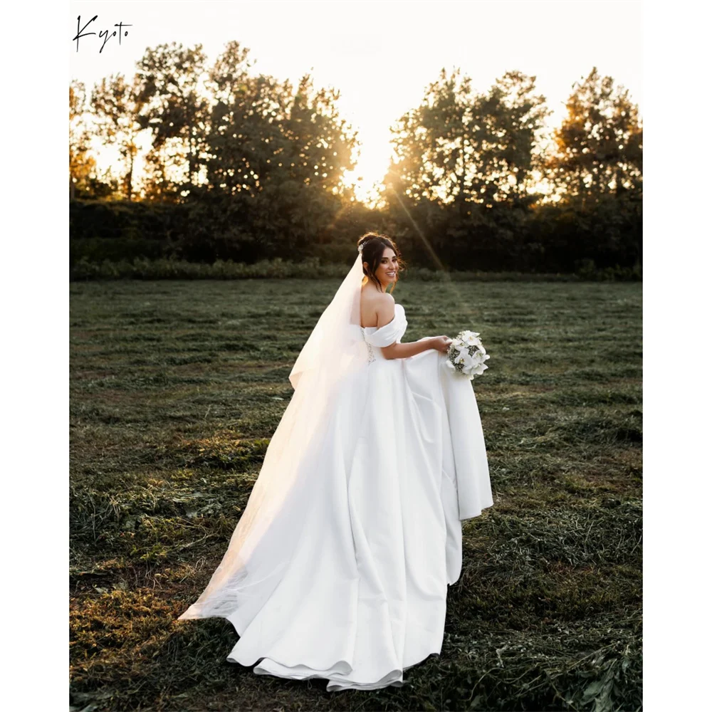 Kobe White Off the Shoulder Ball Gown Evening Dresses Complimentary Veil Prom Dresses Lace-Up Chapel Train Wedding Dresses 2025
Kobe White Off the Shoulder Ball Gown Evening Dresses Complimentary Veil Prom Dresses Lace-Up Chapel Train Wedding Dresses 2025
