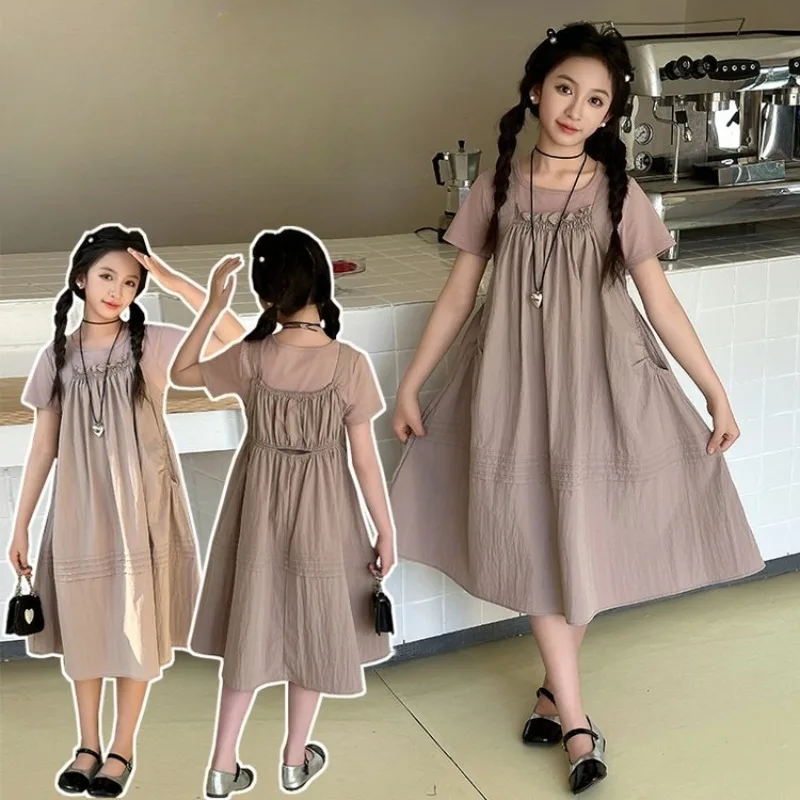 Girls Summer Strap Skirt Set Fashion Children's Short Sleeved T-Shirt + Sleeveless Dress Two-Piece Set 2025 New
Girls Summer Strap Skirt Set Fashion Children's Short Sleeved T-Shirt + Sleeveless Dress Two-Piece Set 2025 New