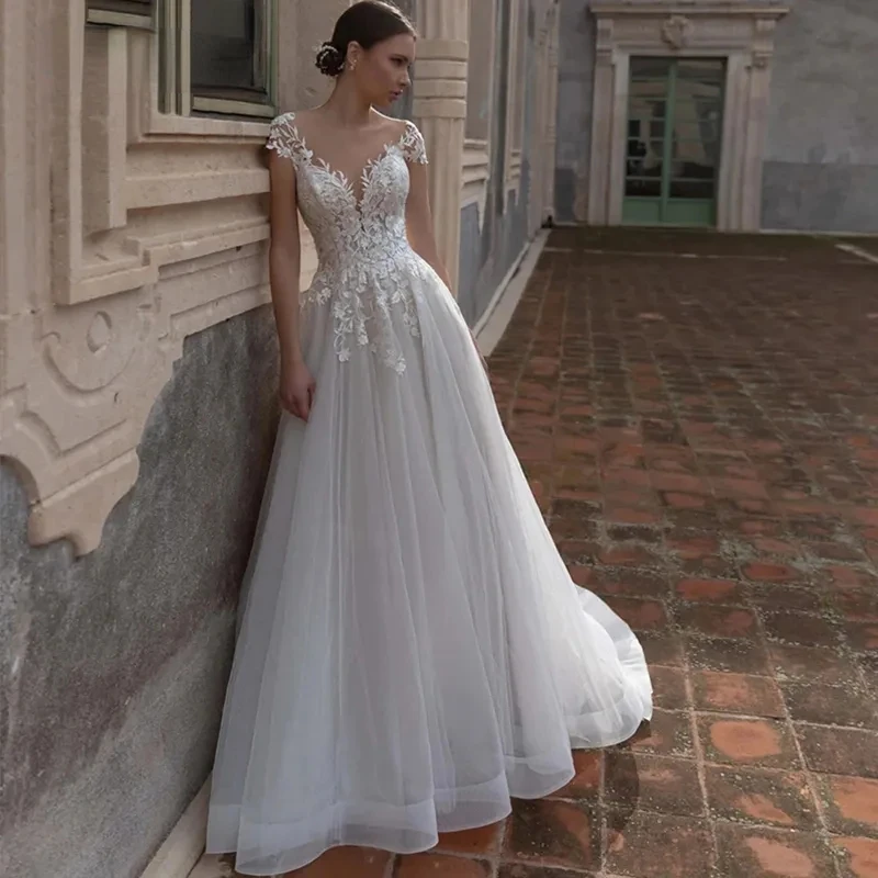 2023 Simple Backless Boat-Neck Off Shouder Wedding Dress Elegant Sceep Lace Applique Tulle Bridal Gown
2023 Simple Backless Boat-Neck Off Shouder Wedding Dress Elegant Sceep Lace Applique Tulle Bridal Gown