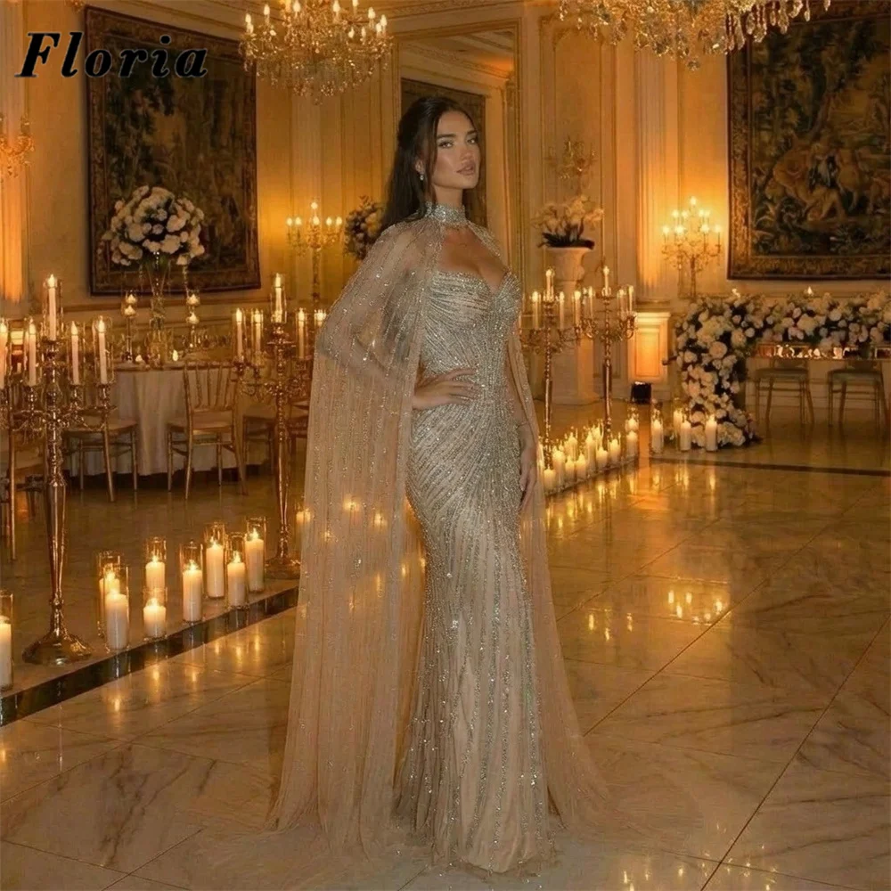 Индивидуальные серебряные вечерние платья с рукавами-накидками в стиле Ближнего Востока, свадебные платья-русалки, расшитые бисером, для вечеринок и коктейлей.
Индивидуальные серебряные вечерние платья с рукавами-накидками в стиле Ближнего Востока, свадебные платья-русалки, расшитые бисером, для вечеринок и коктейлей.