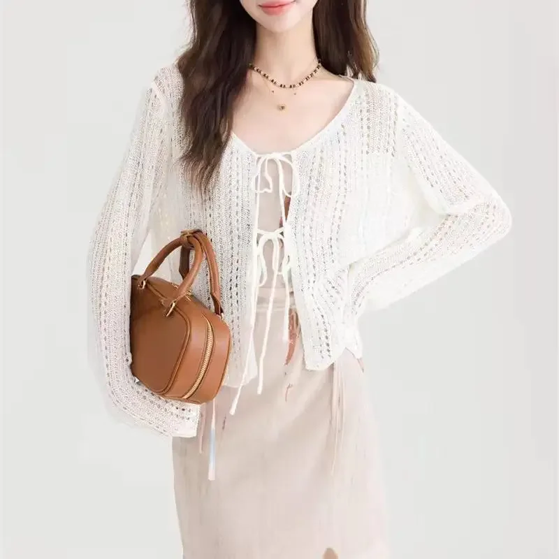 Summer Hollow Out Thin Air Conditioning Cover Shirt Knitted Cardigan Women's Sweaters Casual Shawl Sweater Bow White Crop Tops
Summer Hollow Out Thin Air Conditioning Cover Shirt Knitted Cardigan Women's Sweaters Casual Shawl Sweater Bow White Crop Tops