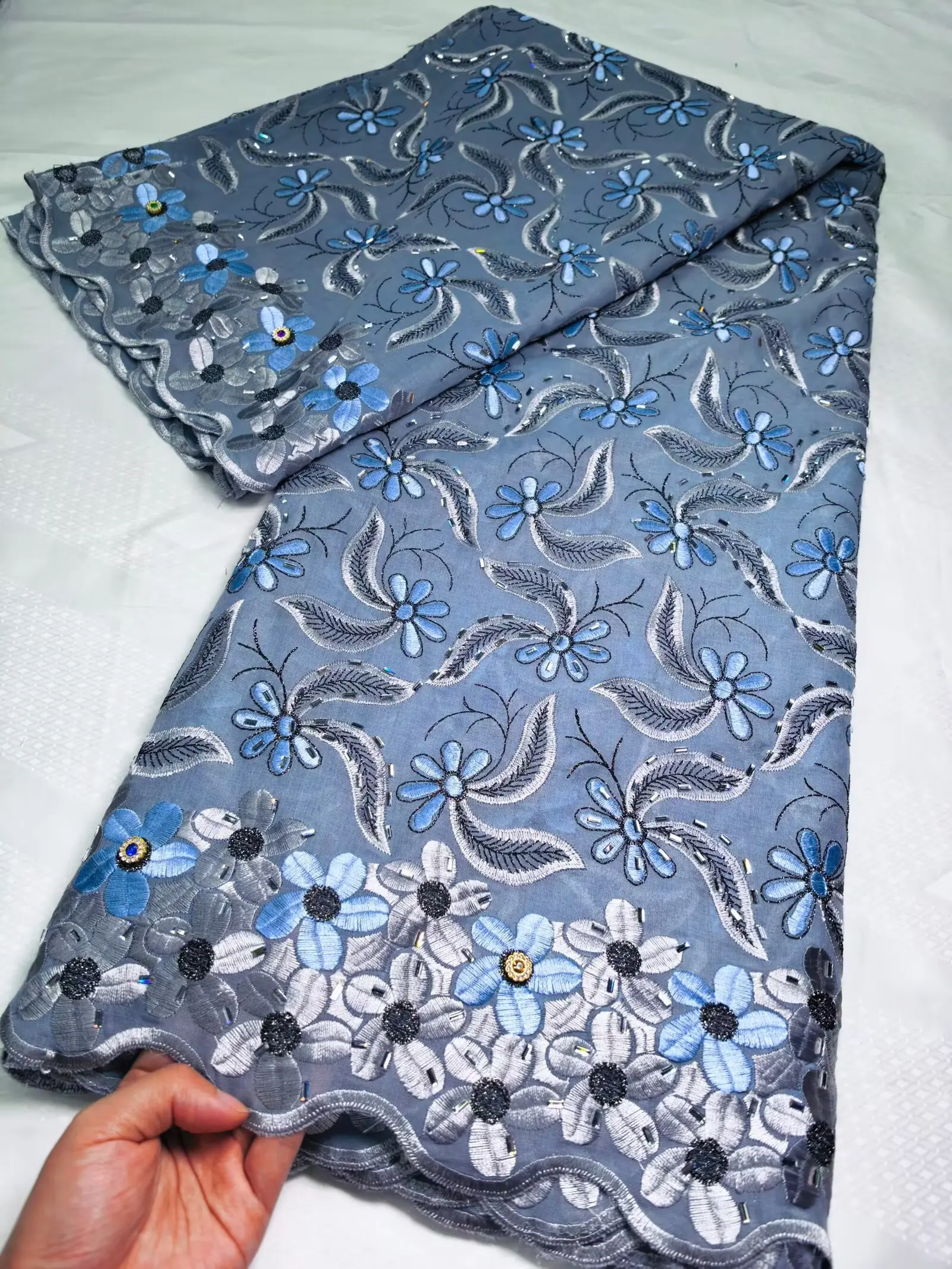 High Quality Nigerian Cotton Lace Fabric With Stones 2026 New Design African Swiss Voile Lace Fabric for Women's Wedding Sewing
High Quality Nigerian Cotton Lace Fabric With Stones 2026 New Design African Swiss Voile Lace Fabric for Women's Wedding Sewing